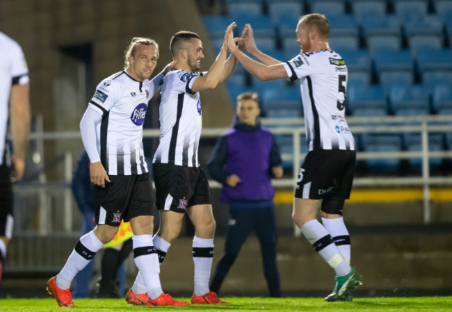 Dundalk players celebrate after Michael Duffy scores their third goal