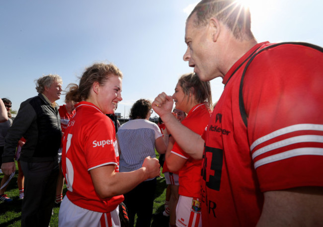 Libbby Coppinger and Ephie Fitzgerald celebrate after the game