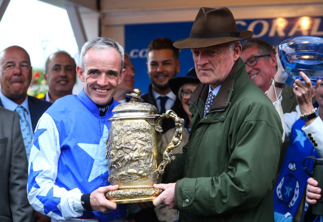 Ruby Walsh and Willie Mullins with the Coral Punchestown Gold Cup after winning with Kemboy