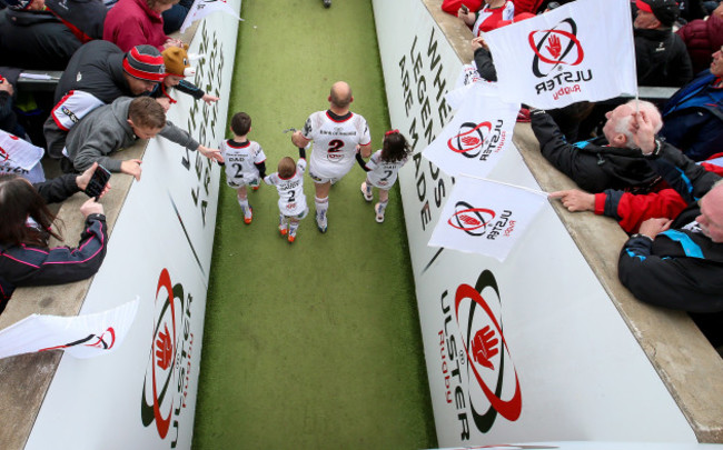 Rory Best leads his team out with his children