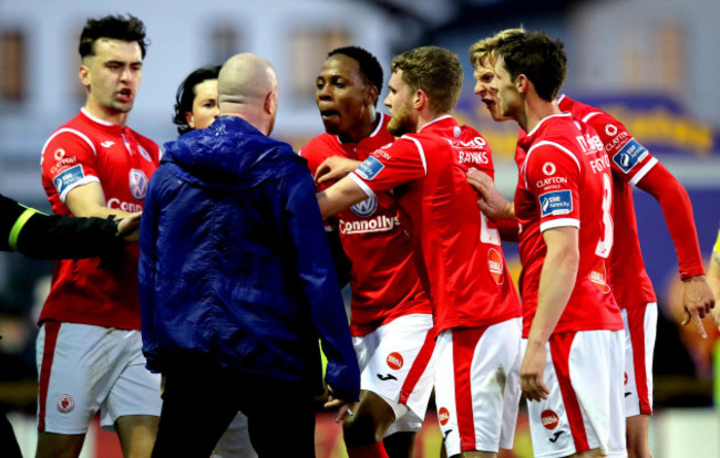 A fan comes on to the pitch as Sligo' celebrates scoring their second goal