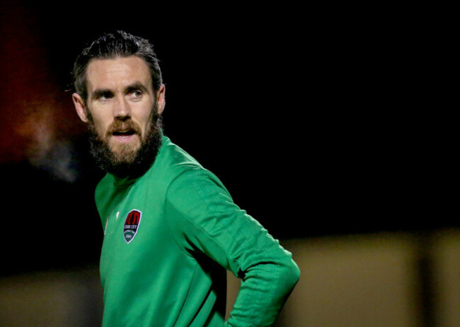 Mark McNulty warms up before the game