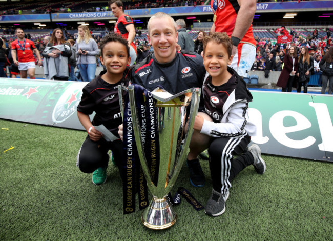 Phil Morrow celebrates with his kids after the game