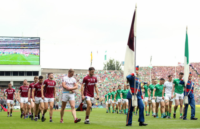 The two teams parade