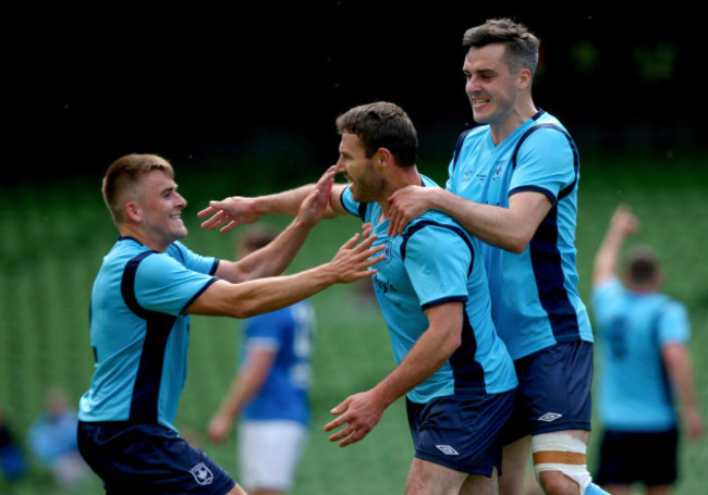 Mark O'Sullivan celebrates scoring a goal with Jack Walsh and Danny O'Connell