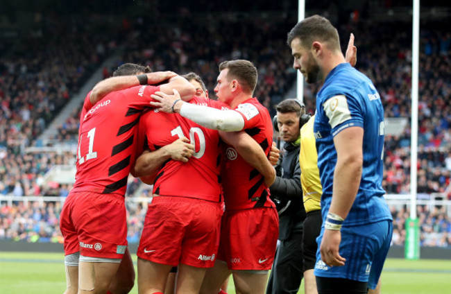 Sean Maitland celebrates his try with teammates