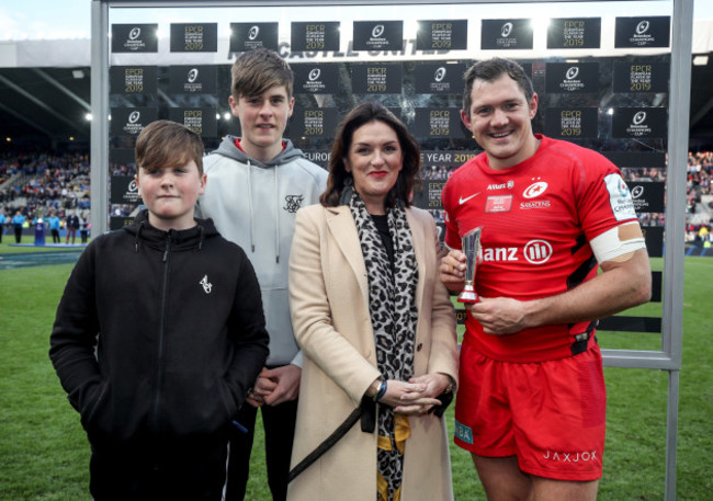 Alex Goode is presented with the EPCR European Player of the Year Award by 