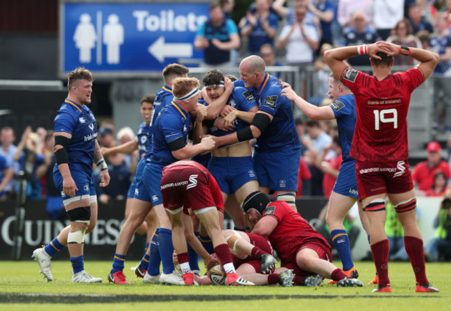 Max Deegan and teammates celebrate winning a penalty in the final moments of the game