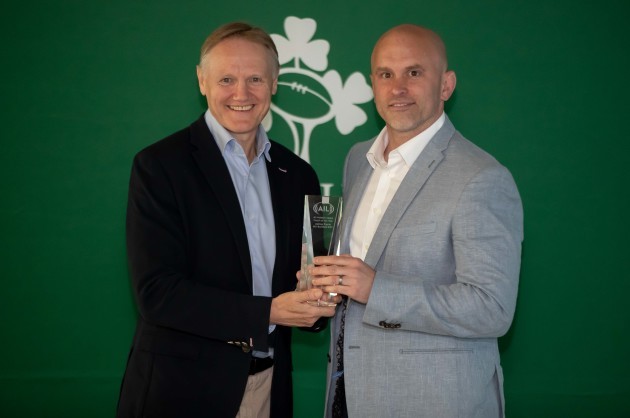 Joe Schmidt presents the AIL Coach of the Year award to Adrian Flavin (MU Barnhall RFC)