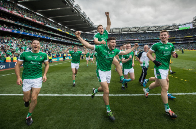 Dan Morrissey, Mike Casey Kevin Downes and William O'Meara celebrate after the game