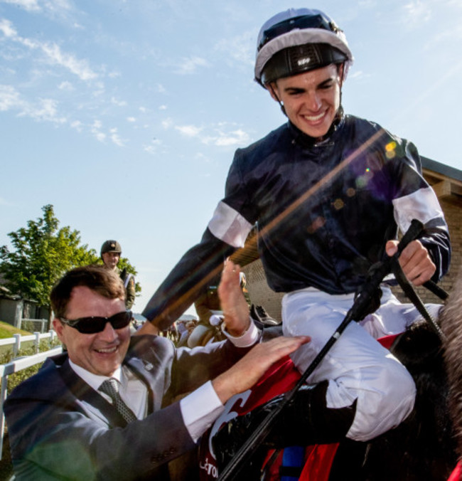 Donnacha O'Brien on Latrobe celebrates winning The Dubai Duty Free Irish Derby with his father Aidan O'Brien