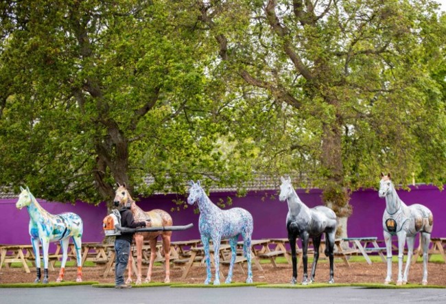 Leopardstown staff put the finishing touches to some ornamental horses