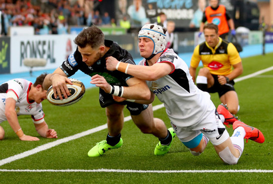 Tommy Seymour scores a try despite Michael Lowry