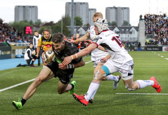 Tommy Seymour scores their fourth try despite Michael Lowry