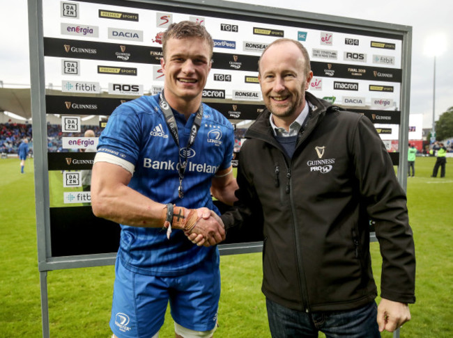 Josh van der Flier receives the man of the match medal from Rory Sheridan