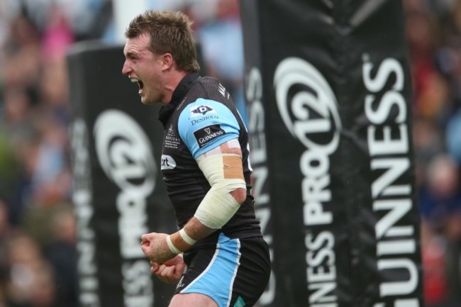 Stuart Hogg celebrates scoring a try