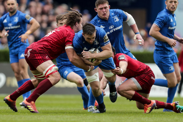 Jack Conan is tackled by Arno Botha and Joey Carbery