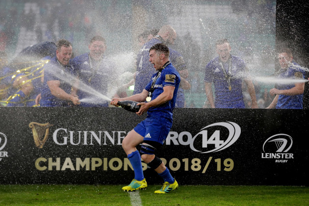 Luke McGrath celebrates with teammates after winning the Guinness PRO14 Final