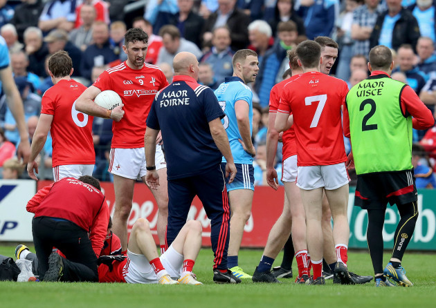Conal McKeever down injured after an incident with Paul Mannion