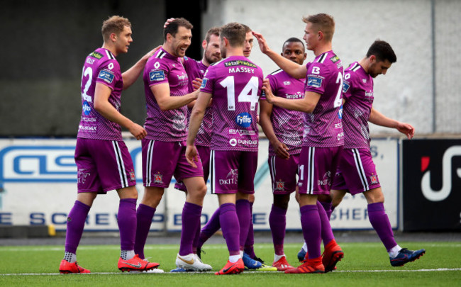 Brian Gartland celebrates scoring with his teammates