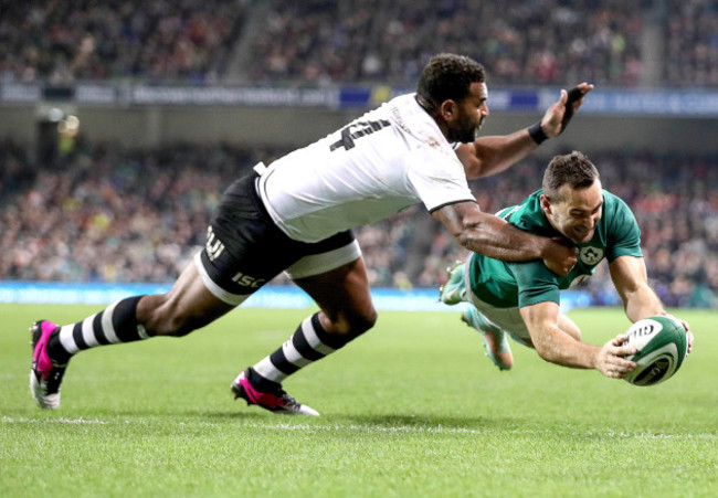 Dave Kearney scores a try despite the efforts of Timoci Nagusa