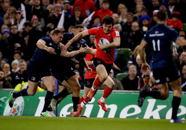 Ulster’s Jacob Stockdale chased by Leinster's Sean Cronin and Adam Byrne