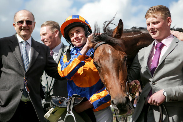 Michael Tabor and Ryan Lee Moore with Hermosa after winning The Tattersalls Irish 1,000 Guineas