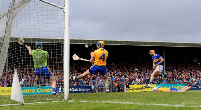 Seamus Callanan scores his sides second goal despite goalkeeper Donal Tuohy, Seadna Morey and Patrick O'Connor