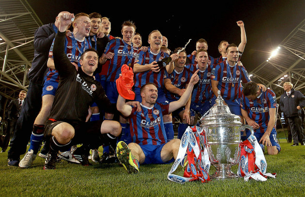 The Pat's team celebrate with the trophy