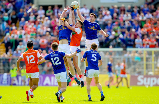 Gearoid McKiernan and Thomas Galligan with Niall Grimley