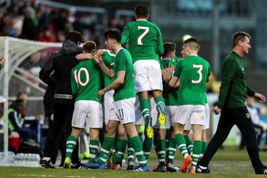 Adam Idah celebrates scoring a goal with teammates