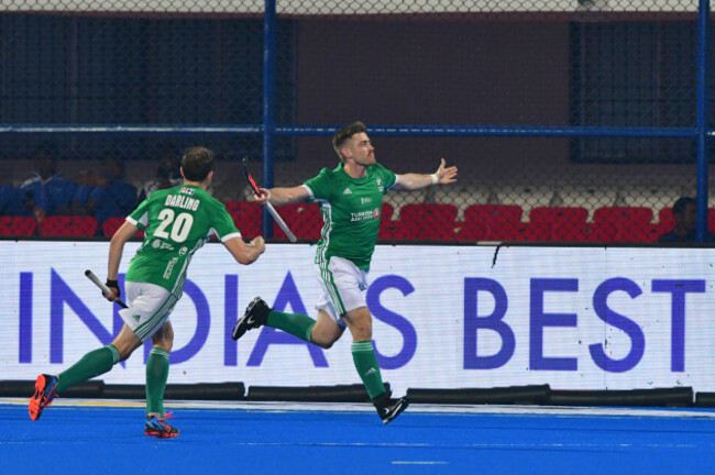 Shane O'Donoghue celebrates his goal with Michael Darling