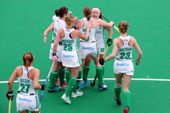 Shirley McCay celebrates scoring a goal with teammates