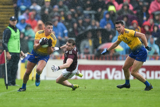 Conor Cox and Tadgh O'Rourke with Thomas Flynn