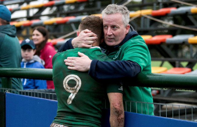 Craig Casey is consoled by his father after the game