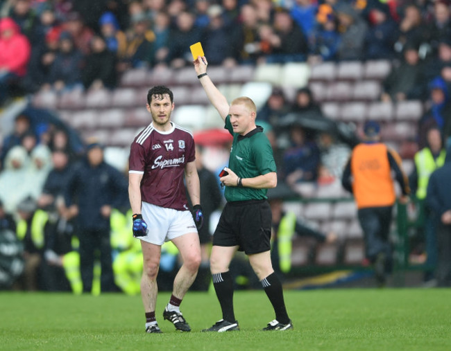 Ian Burke is shown a yellow card