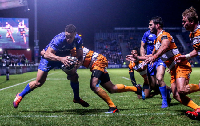 Adam Byrne on his way to scoring a try