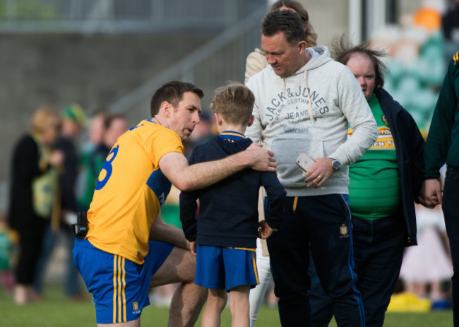 Gary Brennan gets a pic with a young supporter at the full time whistle