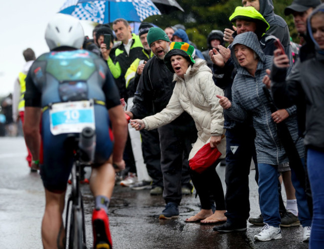 Adam Feigh of The USA is cheered on by supporters up Windmill Hill