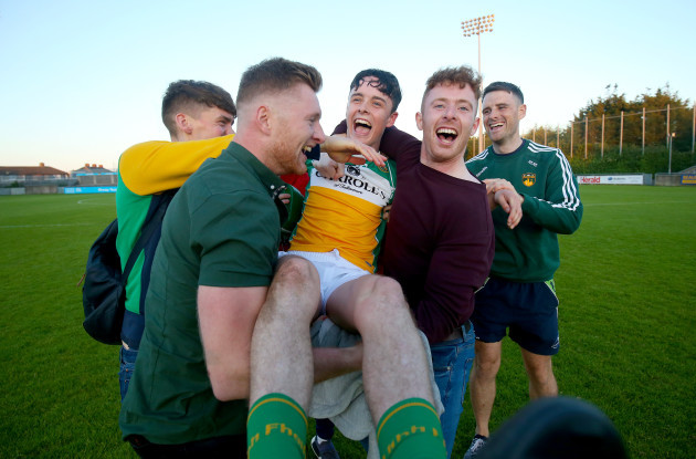 John Murphy celebrates with friends after the game