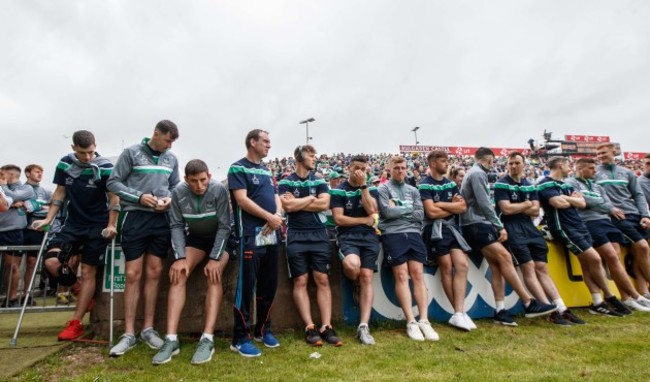 Members of the Limerick team watch the minor game