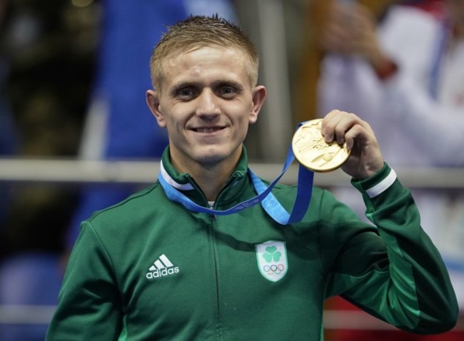 Kurt Walker celebrates with his gold medal