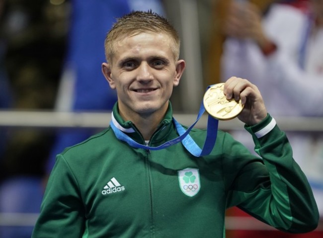 Kurt Walker celebrates with his gold medal