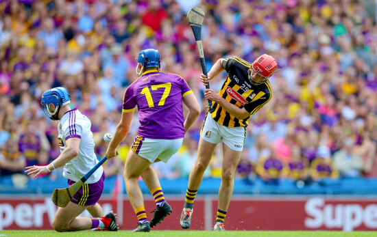 James Maher has a shot saved by Mark Fanning