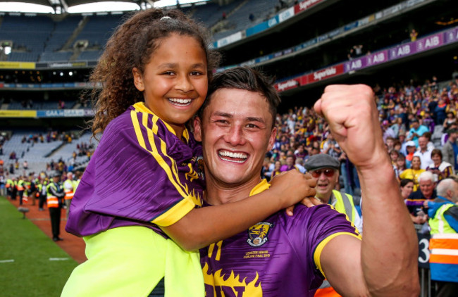 Lee Chin celebrates with his sister Molly