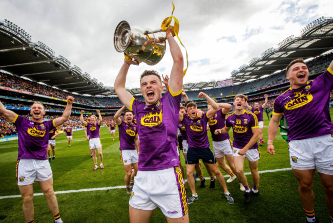 Rory O&rsquo;Connor celebrates with the Bob O'Keeffe Cup