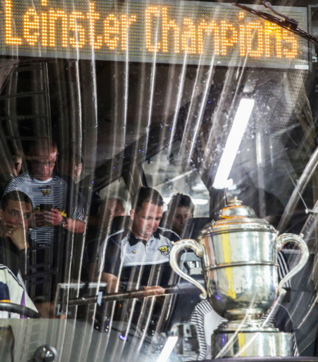 Davy Fitzgerald on the team bus with the trophy after the game