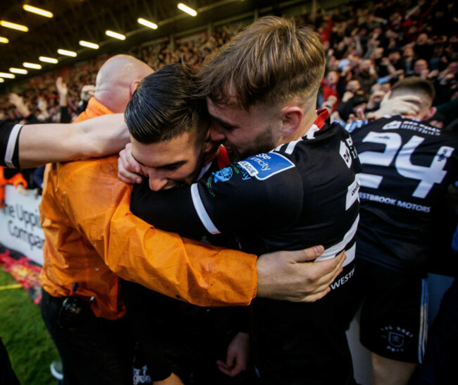 Daniel Mandroiu celebrates scoring with Luke Wade-Slater