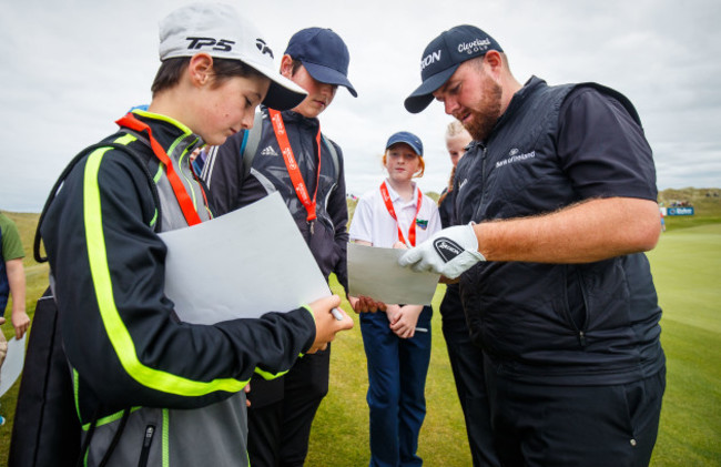 Shane Lowry signs autographs on the 3rd green