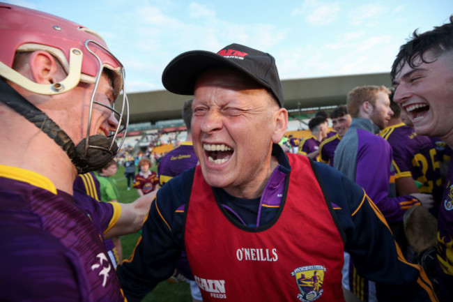 MT Reck celebrates after the game with Ross Banville and Niall Murphy